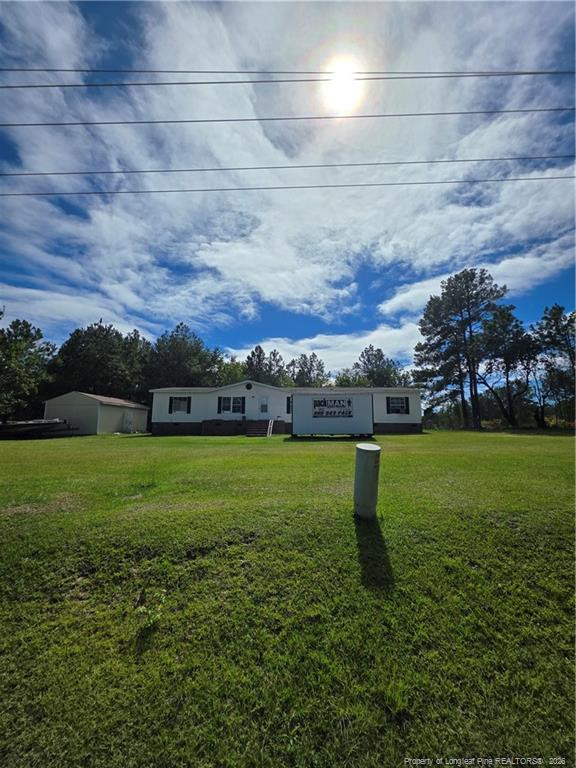 Exterior photo of 1254 Fire Lane Road, Bunnlevel, NC 28323. MLS: 769911