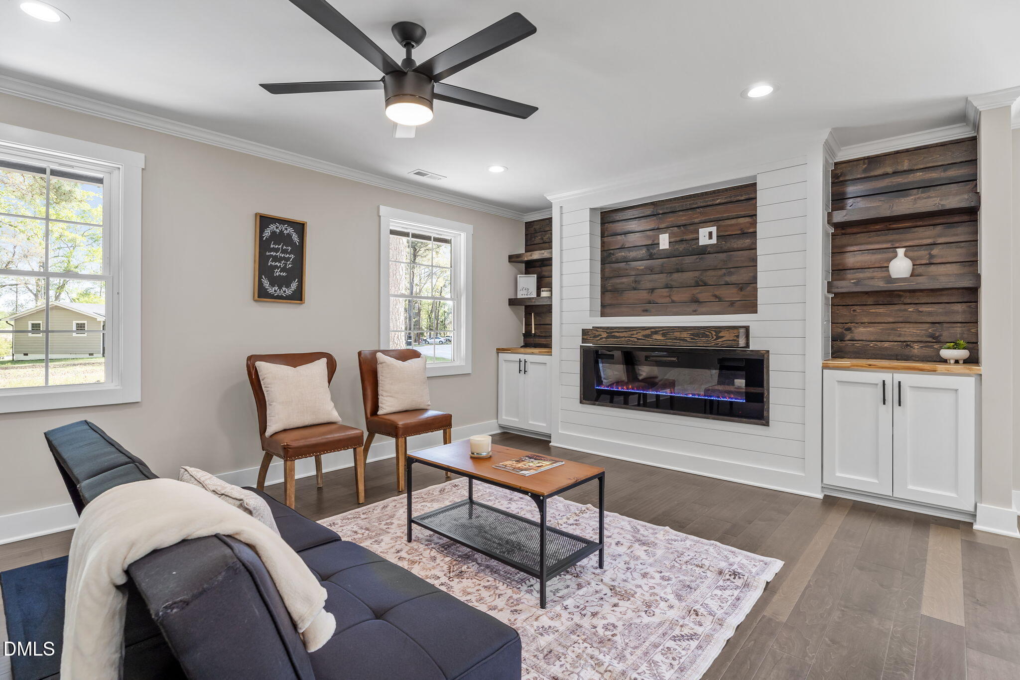 Living Room with built-ins and fireplace