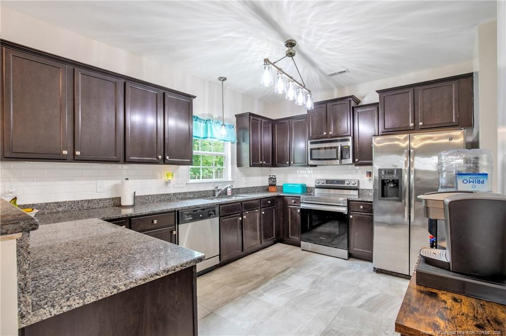 Exterior photo of 141 Rainmaker Street, Linden, NC 28356. MLS: 764206
