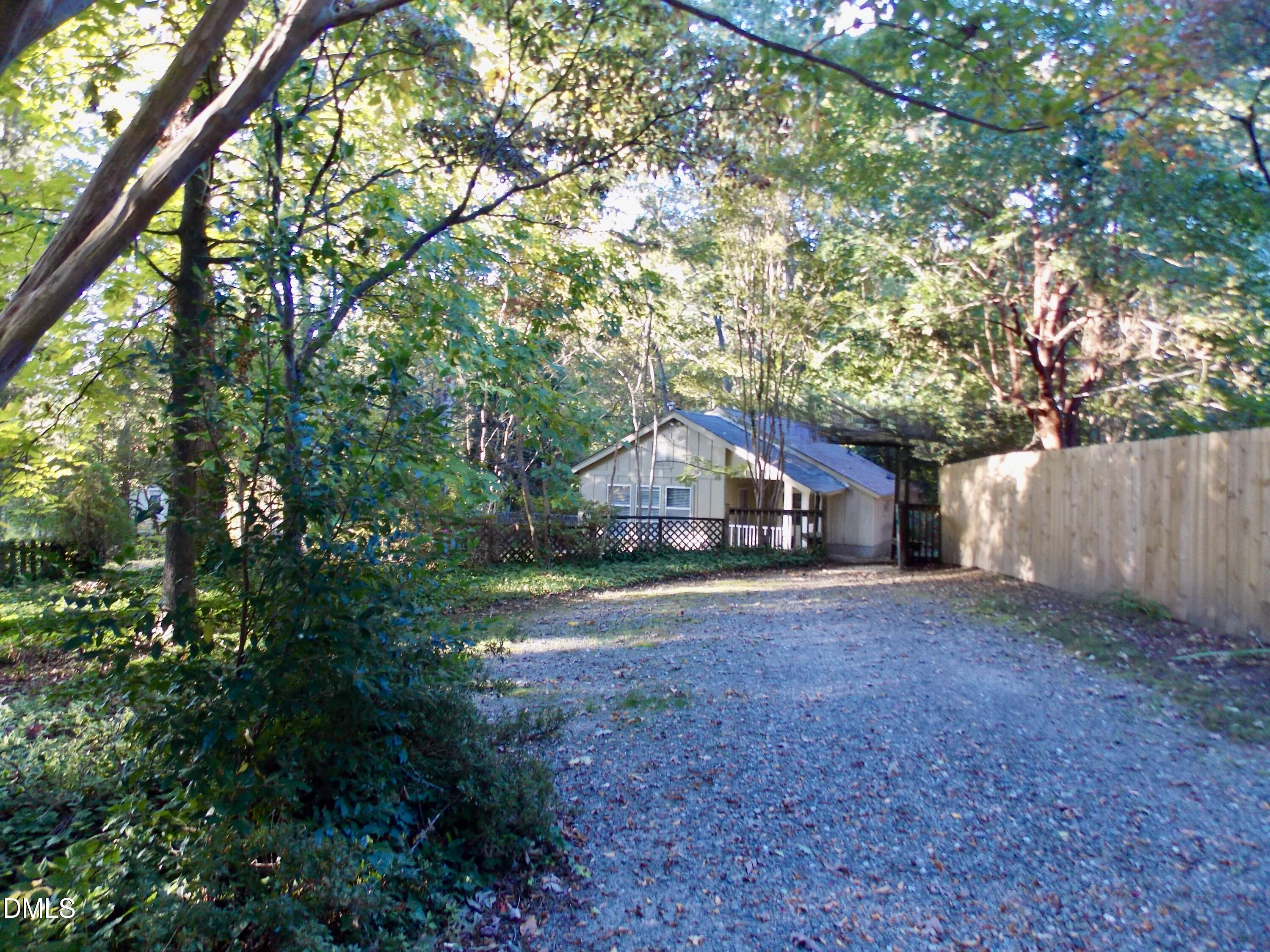 Exterior photo of 1421-a Lynn Road, Raleigh, NC 27612. MLS: 10185049