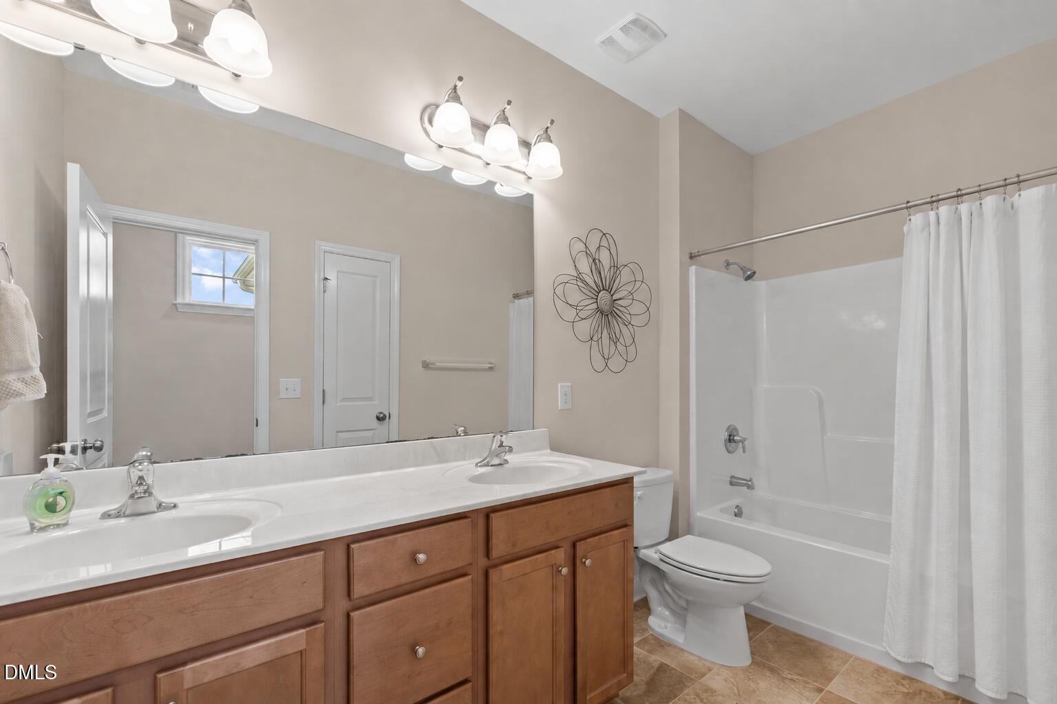 Exterior photo of 1225 Stonemill Falls Drive, Wake Forest, NC 27587. MLS: 10183336