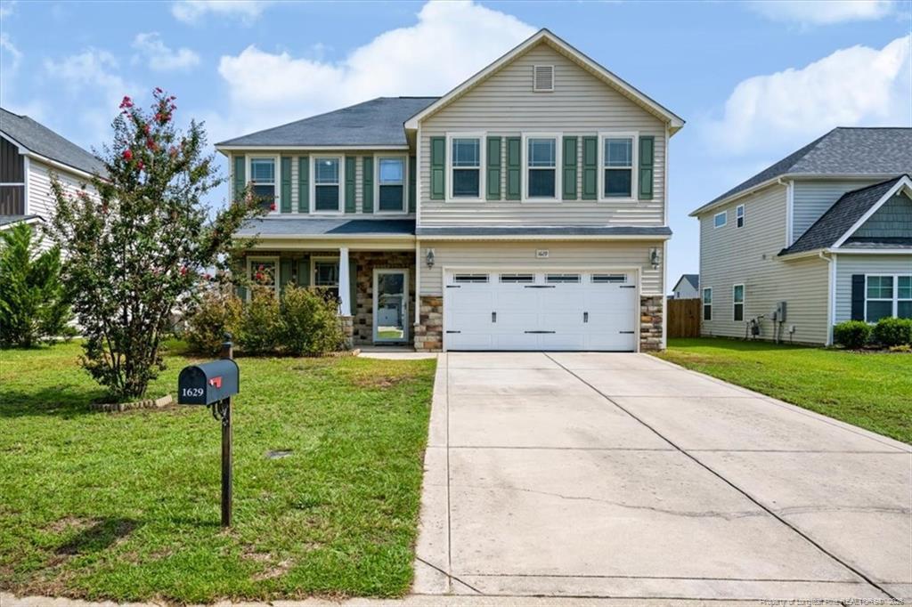 Exterior photo of 1629 Seattle Slew Lane, Hope Mills, NC 28348. MLS: 769200