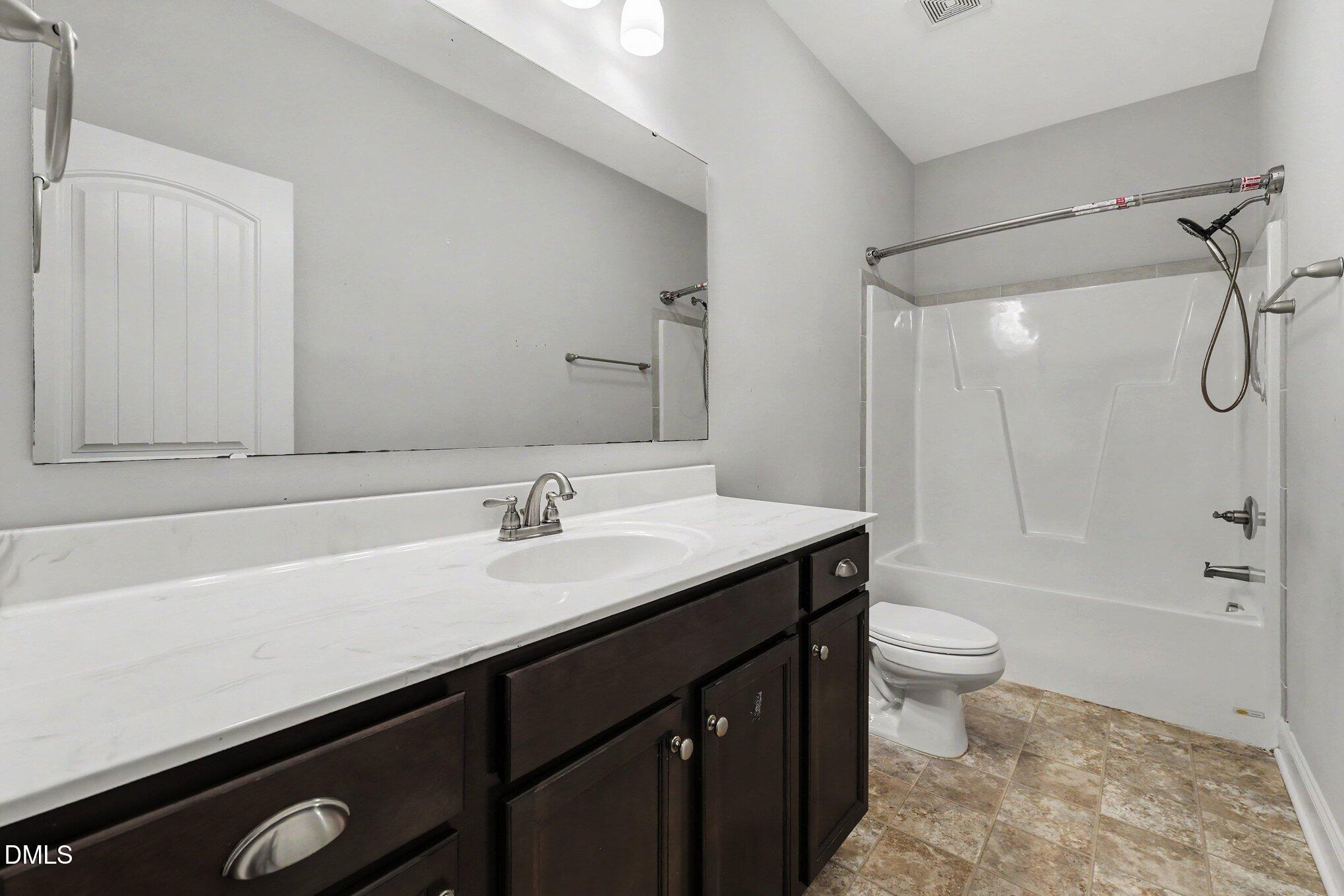 Exterior photo of 3033 N Kilchattan Drive, Fayetteville, NC 28306. MLS: 10182073