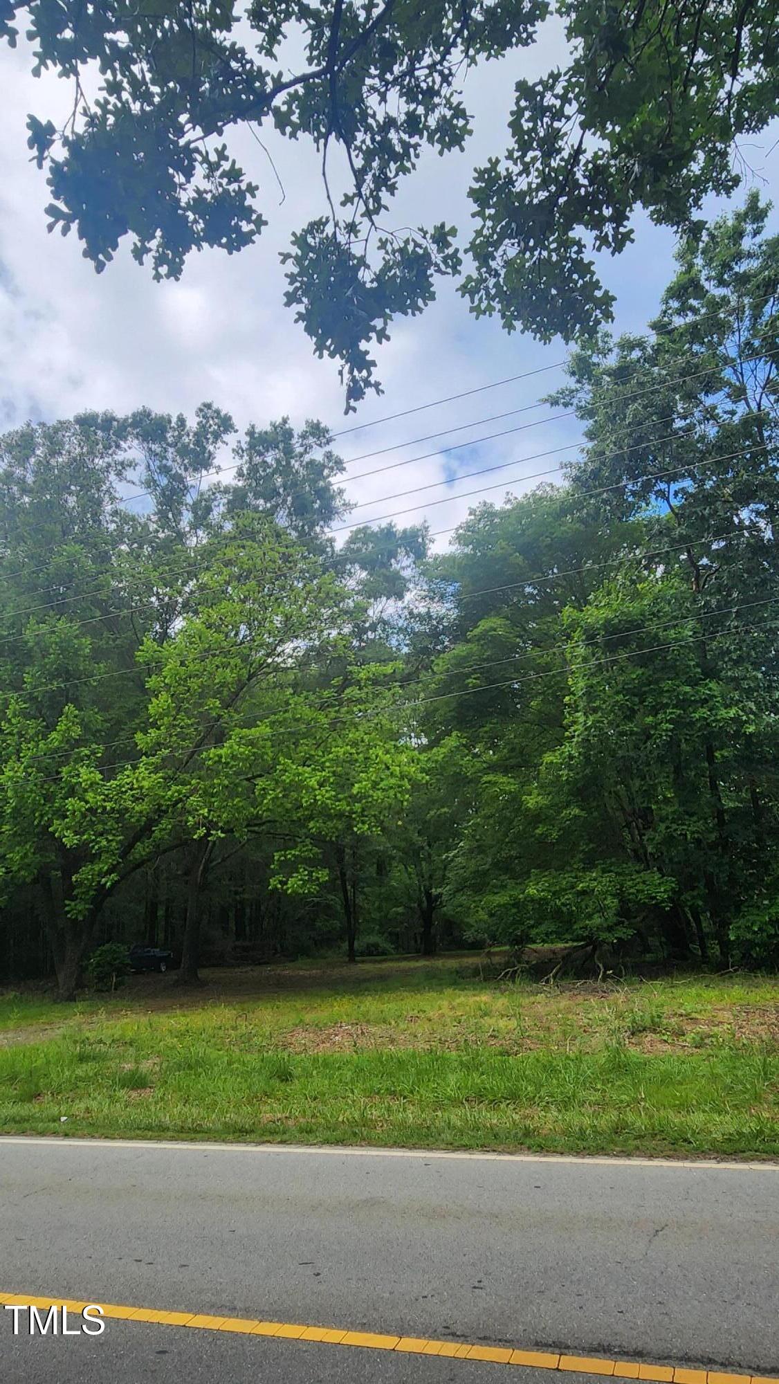 Exterior photo of 8220 Bells Lake Road, Apex, NC 27539. MLS: 10189638