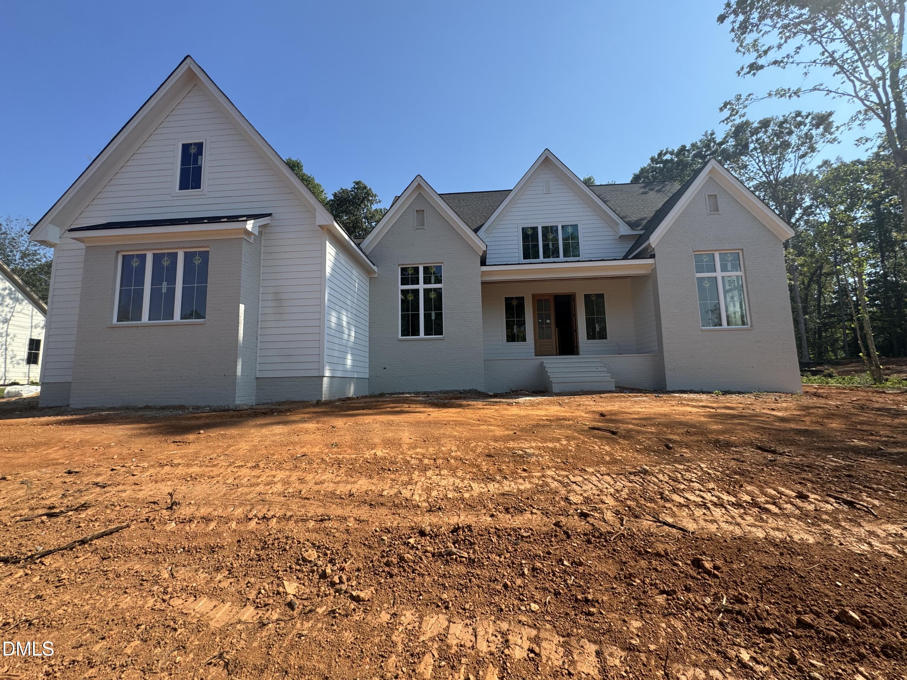 Exterior photo of 396 Mollie Meadow Drive, Zebulon, NC 27597. MLS: 10154465
