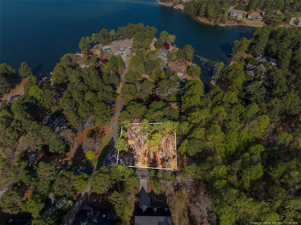 Exterior photo of 118 Otter Drive, West End, NC 27326. MLS: 760075