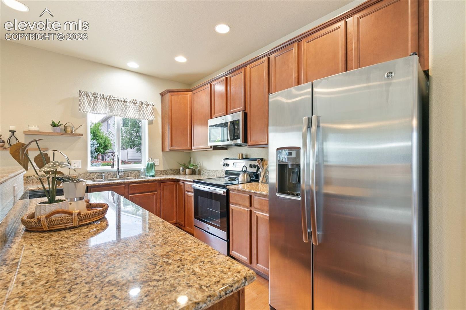 Kitchen featuring stainless appliances and granite countertops