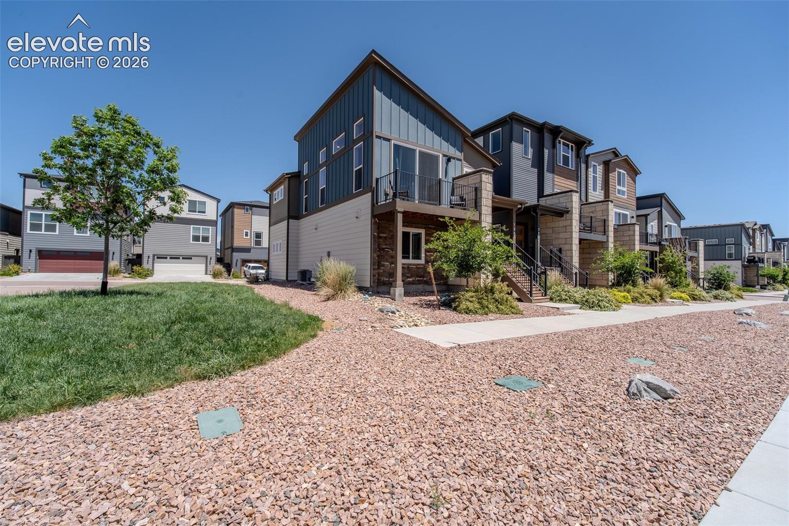 This beautiful contemporary home sits on a corner lot.