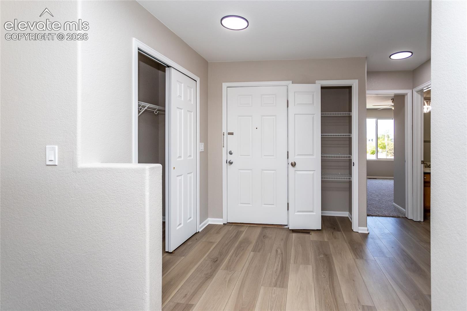 New LVP, plenty of storage for jackets, bags & every day items!