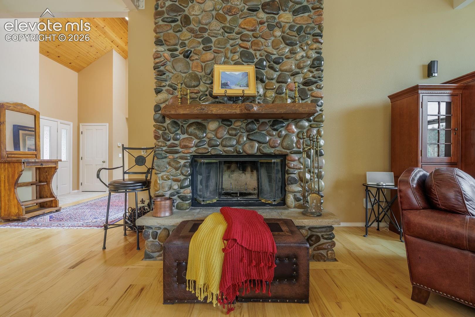 Floor-to-ceiling river rock fireplace!