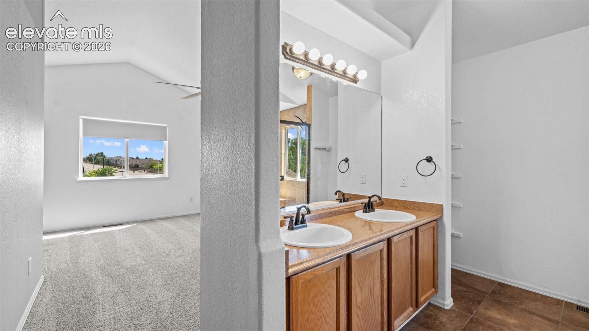 Dual sinks in secondary hall bath