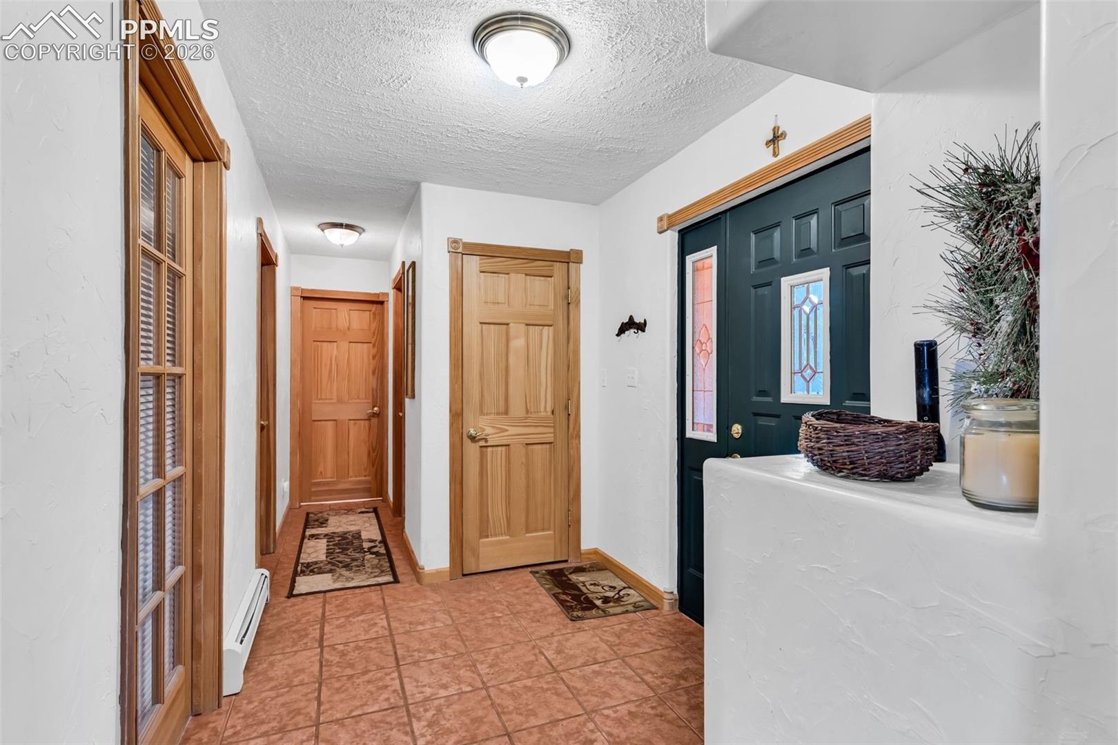 Two additional bedrooms upstairs, full bathroom and office currently set up as a living area