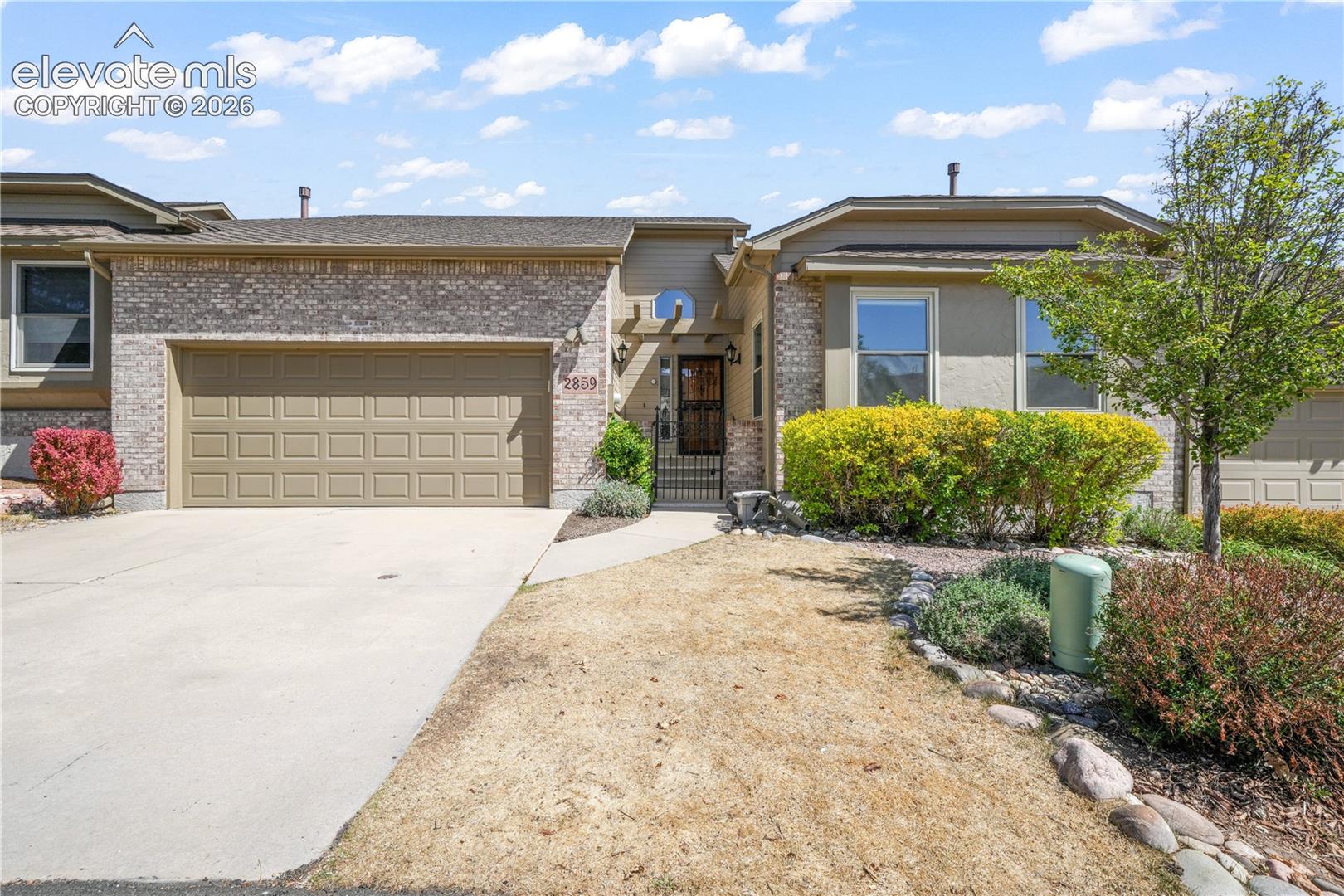 Front of home with 2 car garage