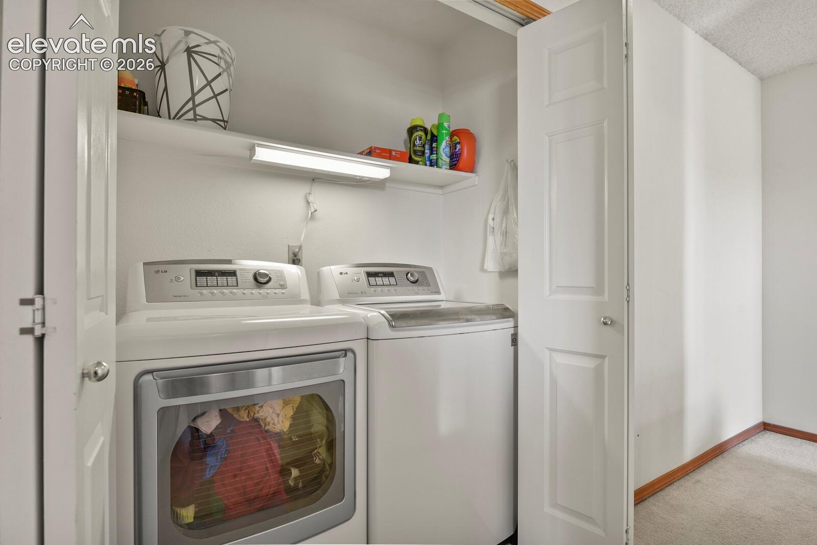 Laundry area, upstairs hallway.