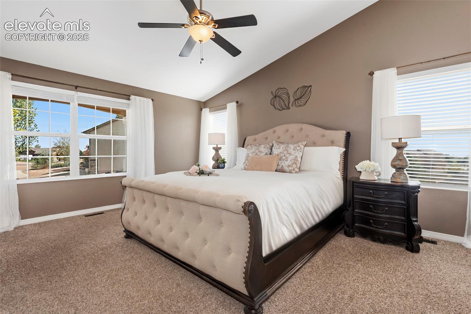 Main Level Primary Bedroom Vaulted Ceilings, an Abundance of Natural Light with Mountain Views
