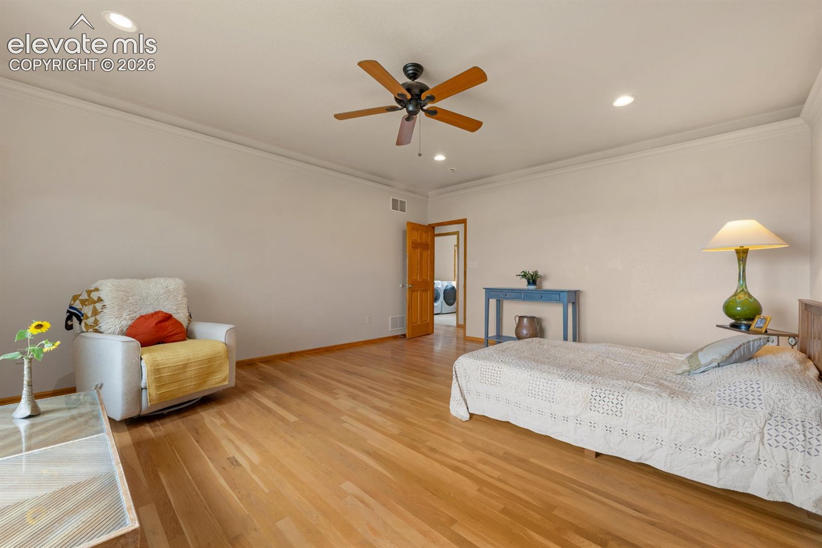 Beautiful hardwoods and room is large at 16x19 .  Multiple ways to situate your furniture with a ton of wall space.  Note the custom details on the ceiling.  Recessed lighting for an ambient relaxed serene space.