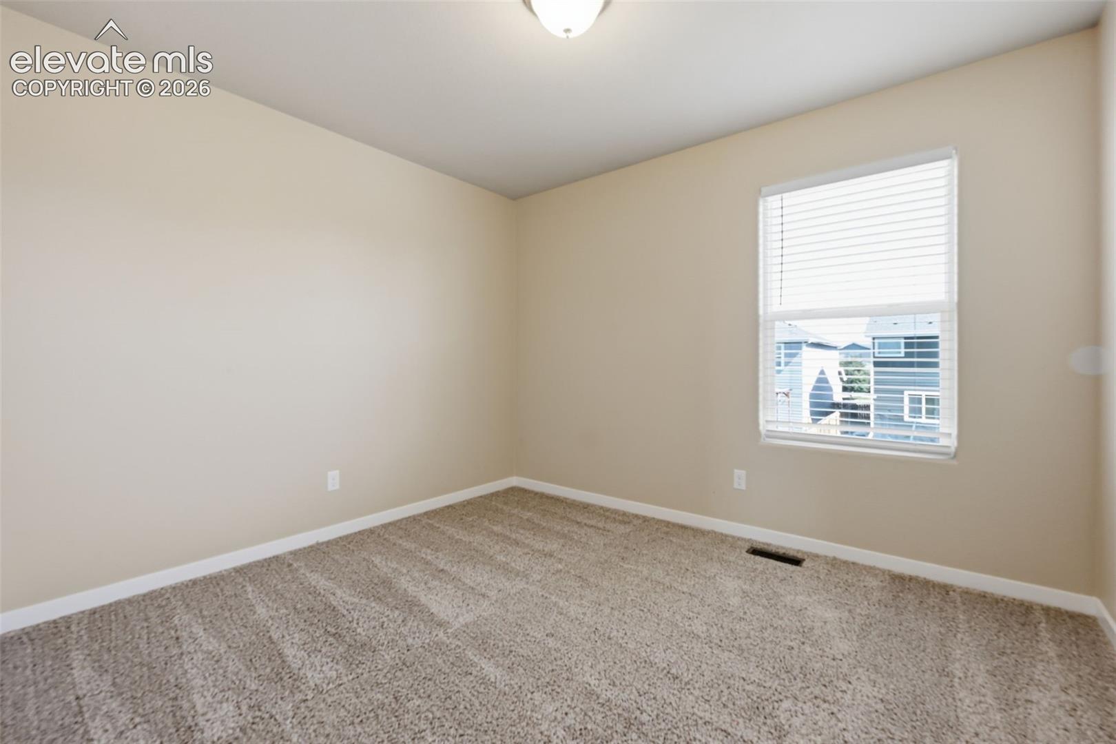 A third secondary bedroom upstairs adds flexibility for family, guests or a dedicated office.