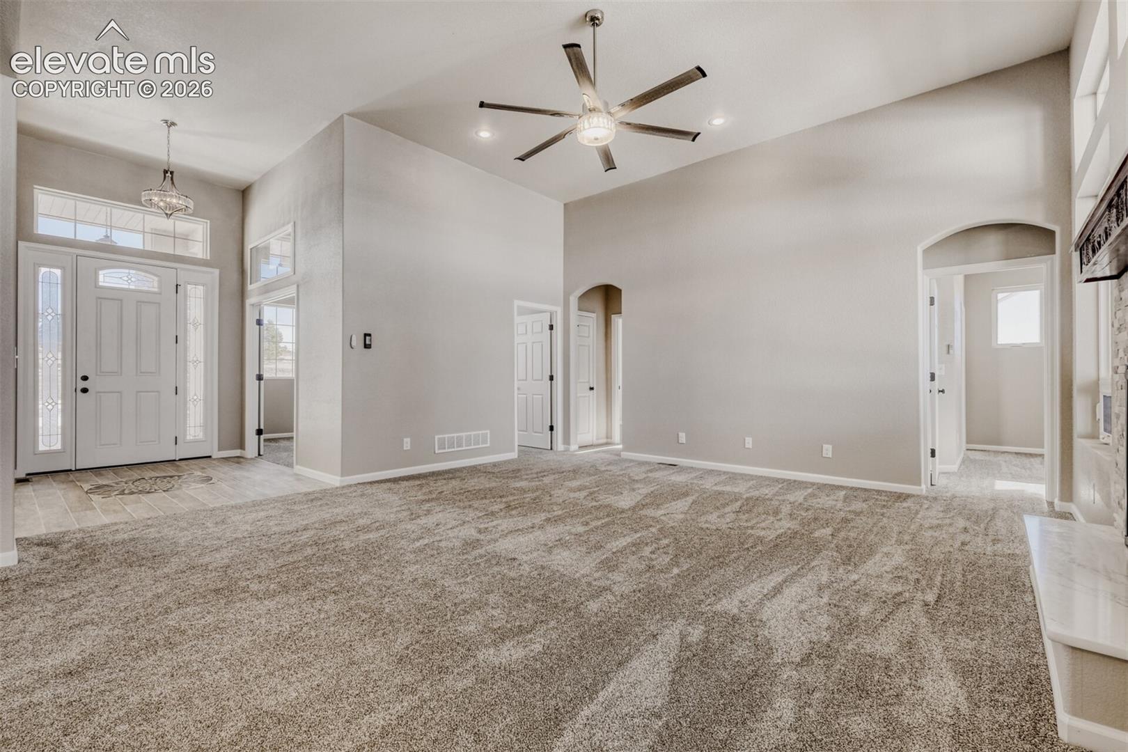 Living Room with open concept and covered deck.