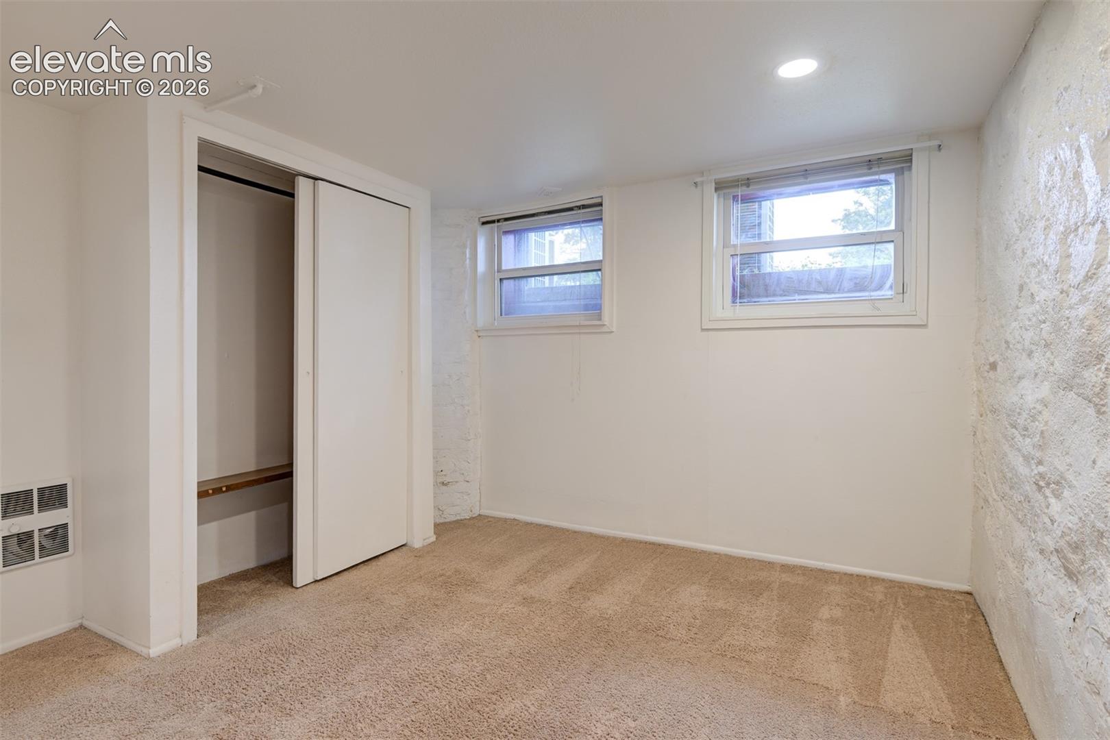Basement unit located in the back of the property 