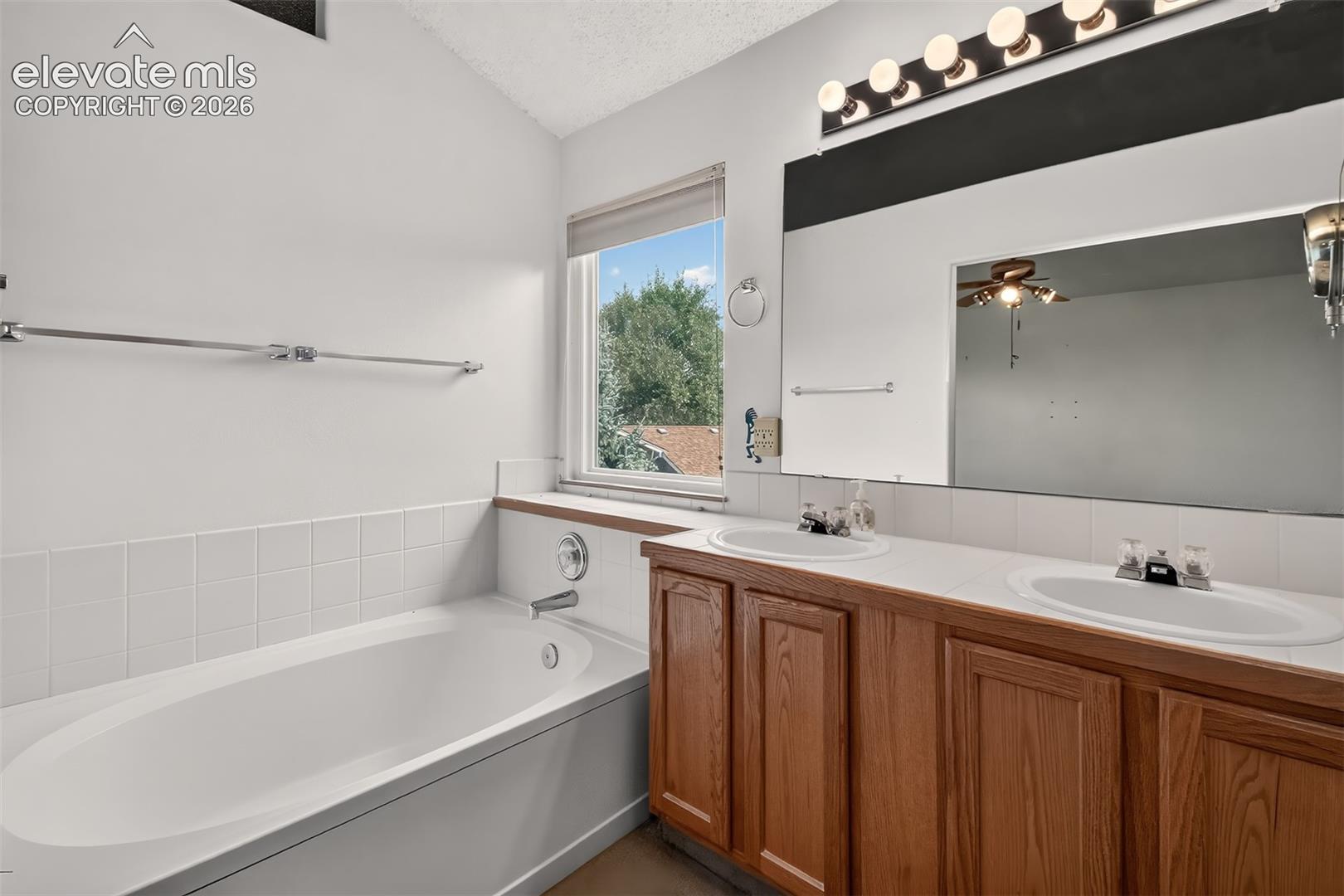 Main Besroom Attached Bath with Soaking Tub and Double Vanity