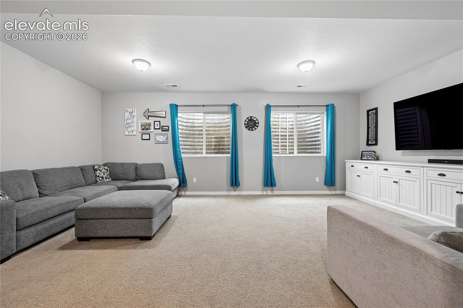 The basement family room makes for a family or common area on all three levels, not even counting the bonus office/ sitting room on the main level.  This could be play space, workout studio, private library, or the game-cave.