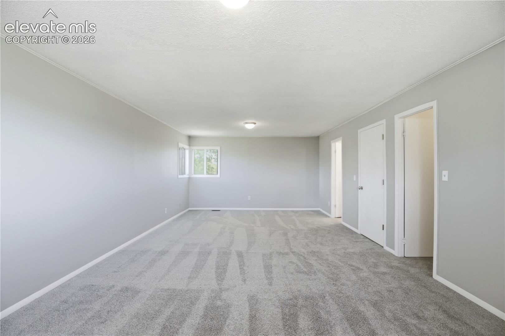 Carpet, Dual Closets, Primary Bath, Large Room, Windows All Around