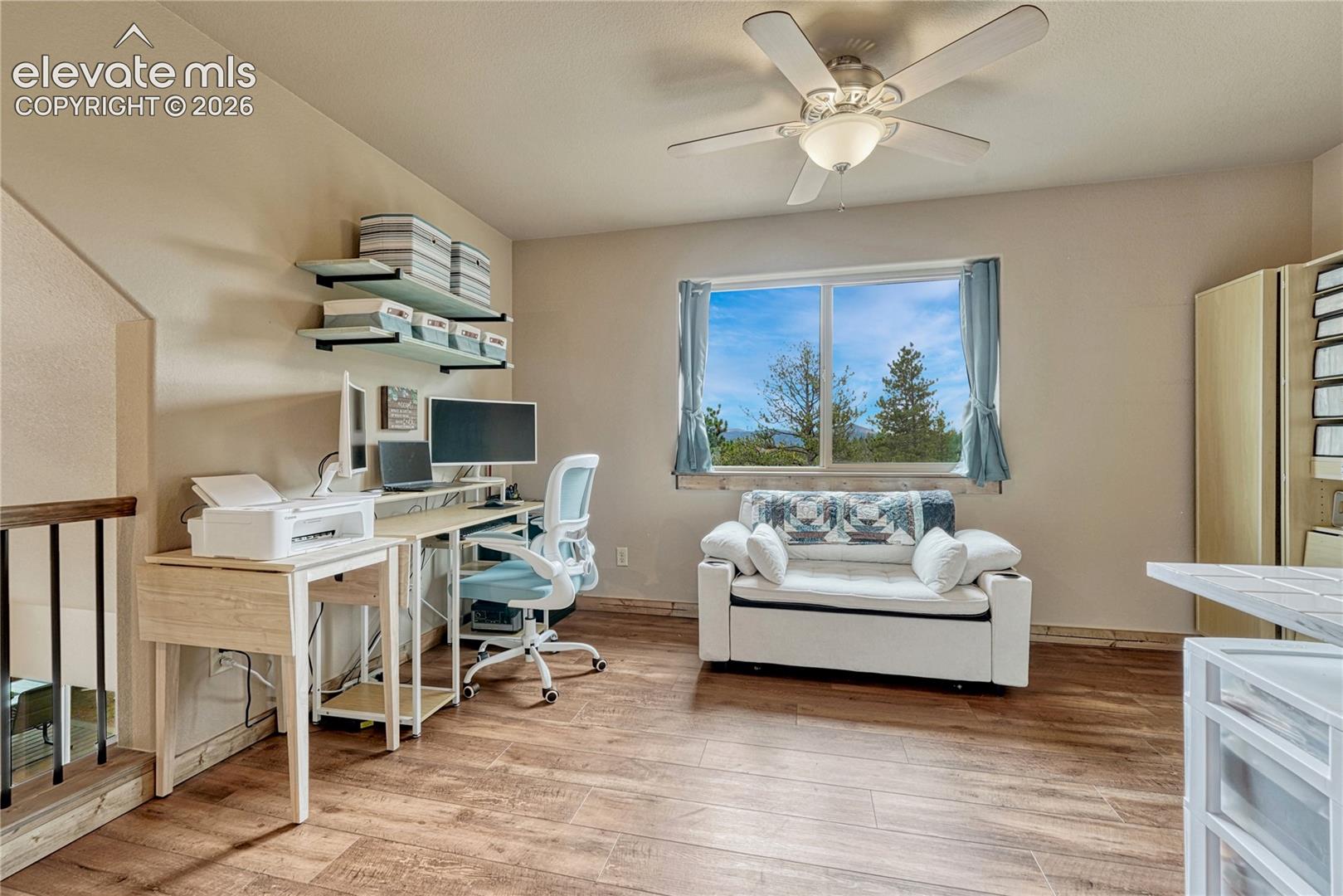 Wood-finish flooring, ceiling fan with integrated lighting
