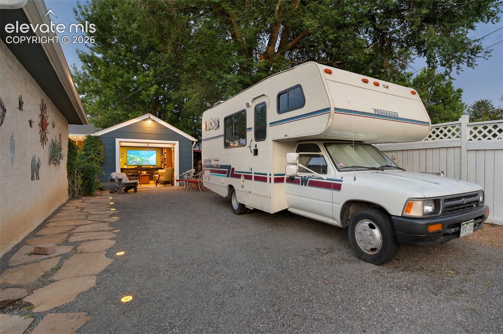 Large RV parking space with plenty of room. Lighted walkway