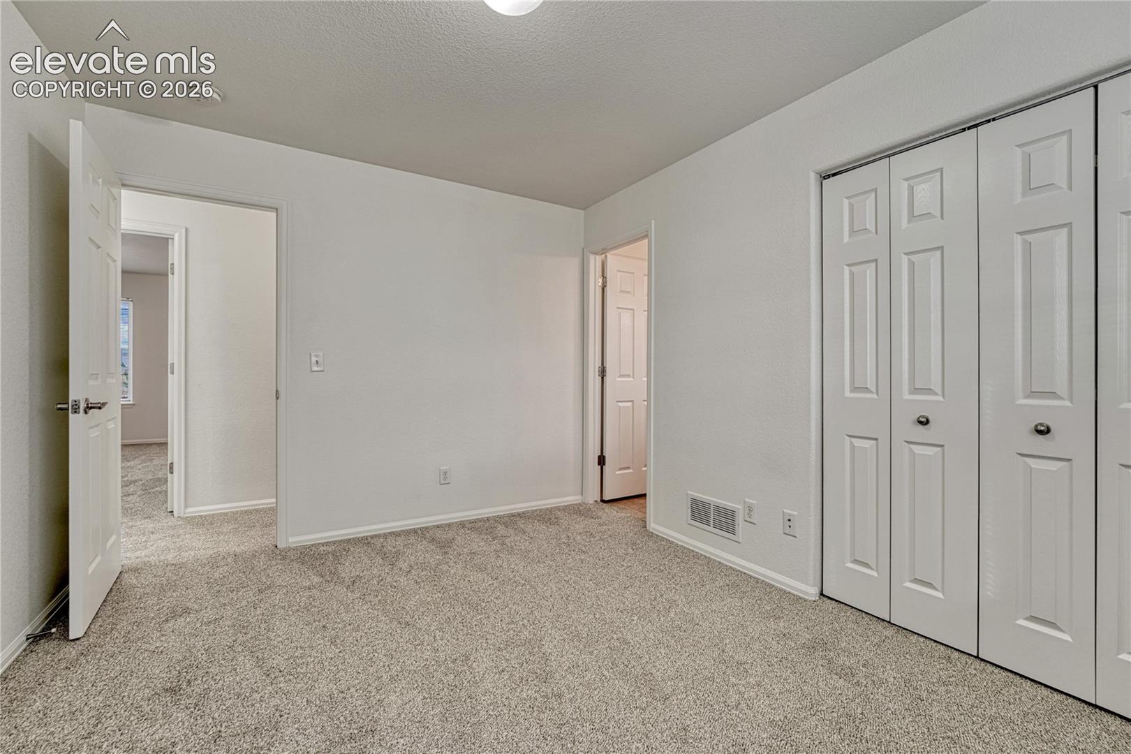 ...shares a bathroom with the second additional bedroom. 