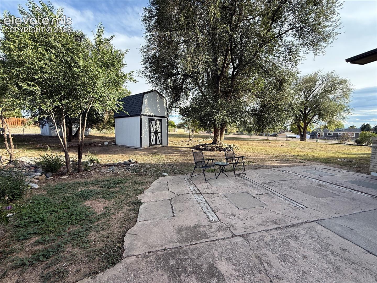 Crown jewel- large accessible backyard with 2 sheds and no HOA