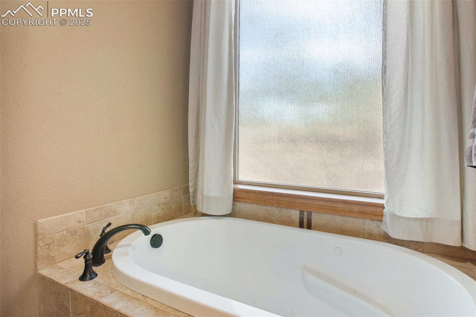 Primary bathroom with jetted tub