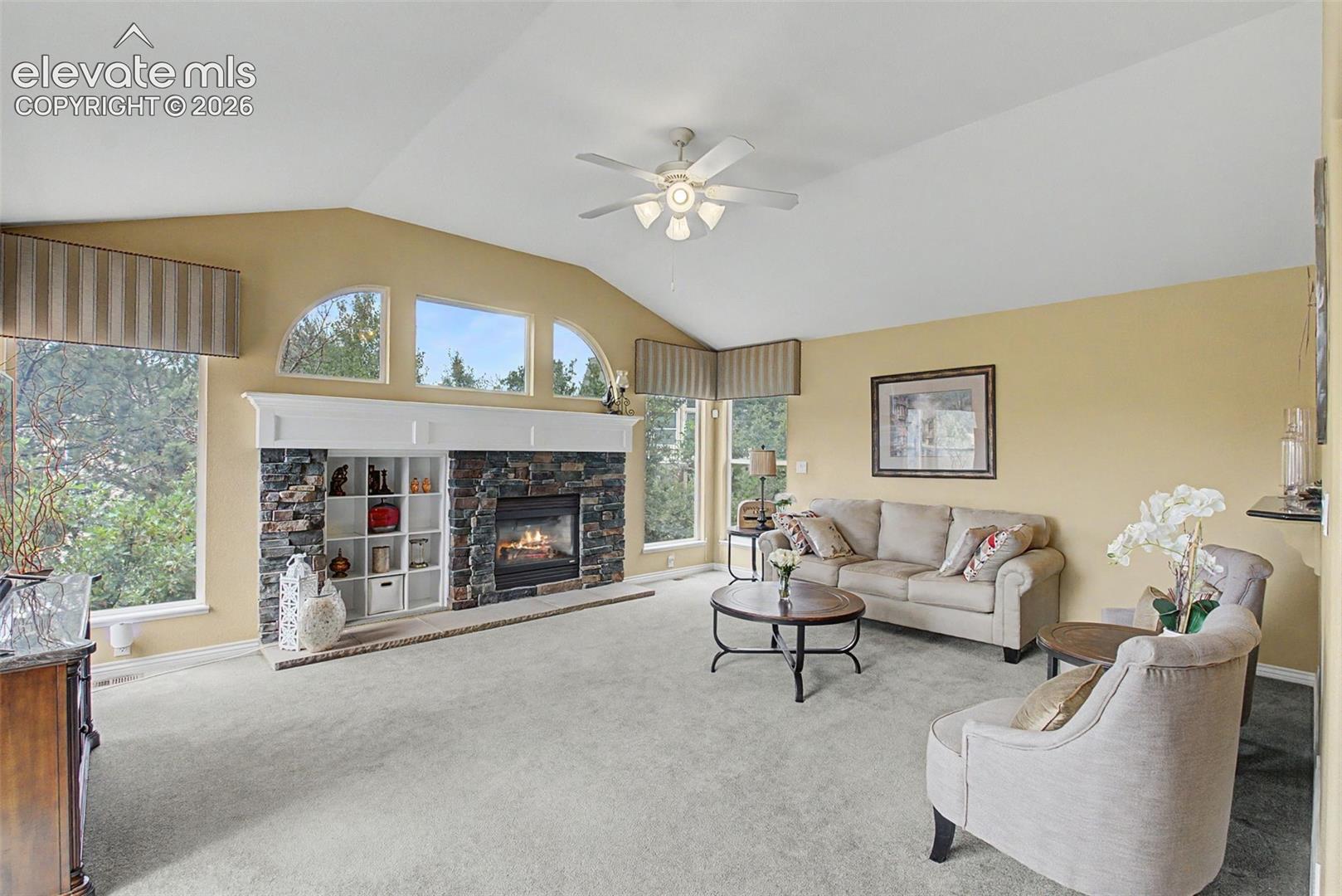 Beautiful Stone Fireplace with Built in Display Niche!