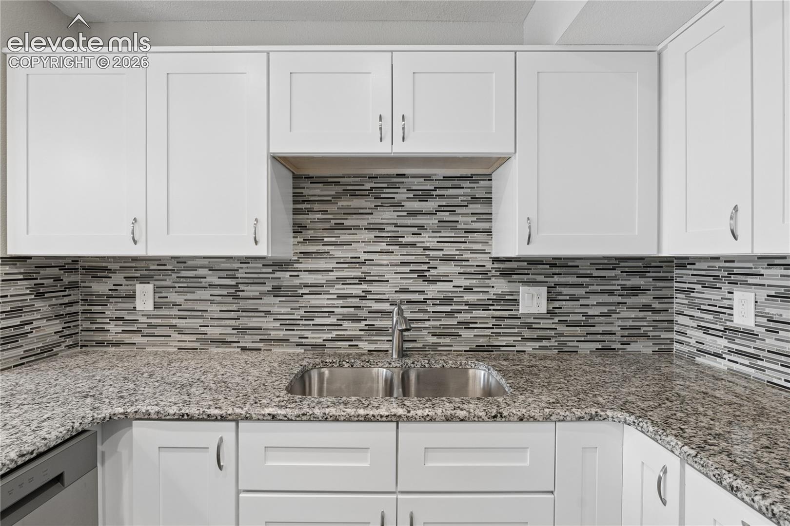 Remodeled Kitchen with new cabinets, granite counters 