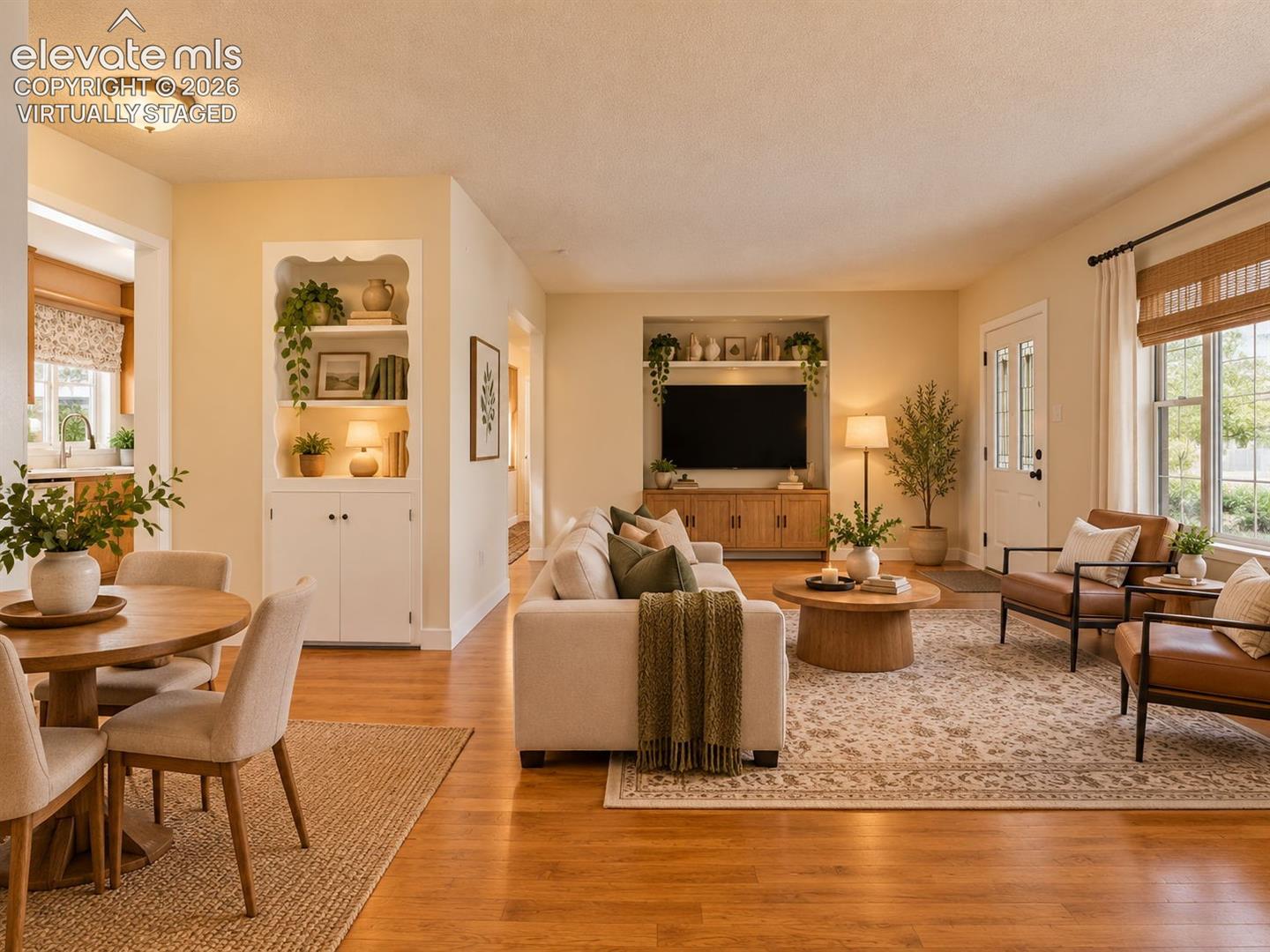 (Virtually Staged)
Another perspective of the inviting living and dining area, highlighting the flexible floor plan, generous natural light, and charming built-in cabinetry.