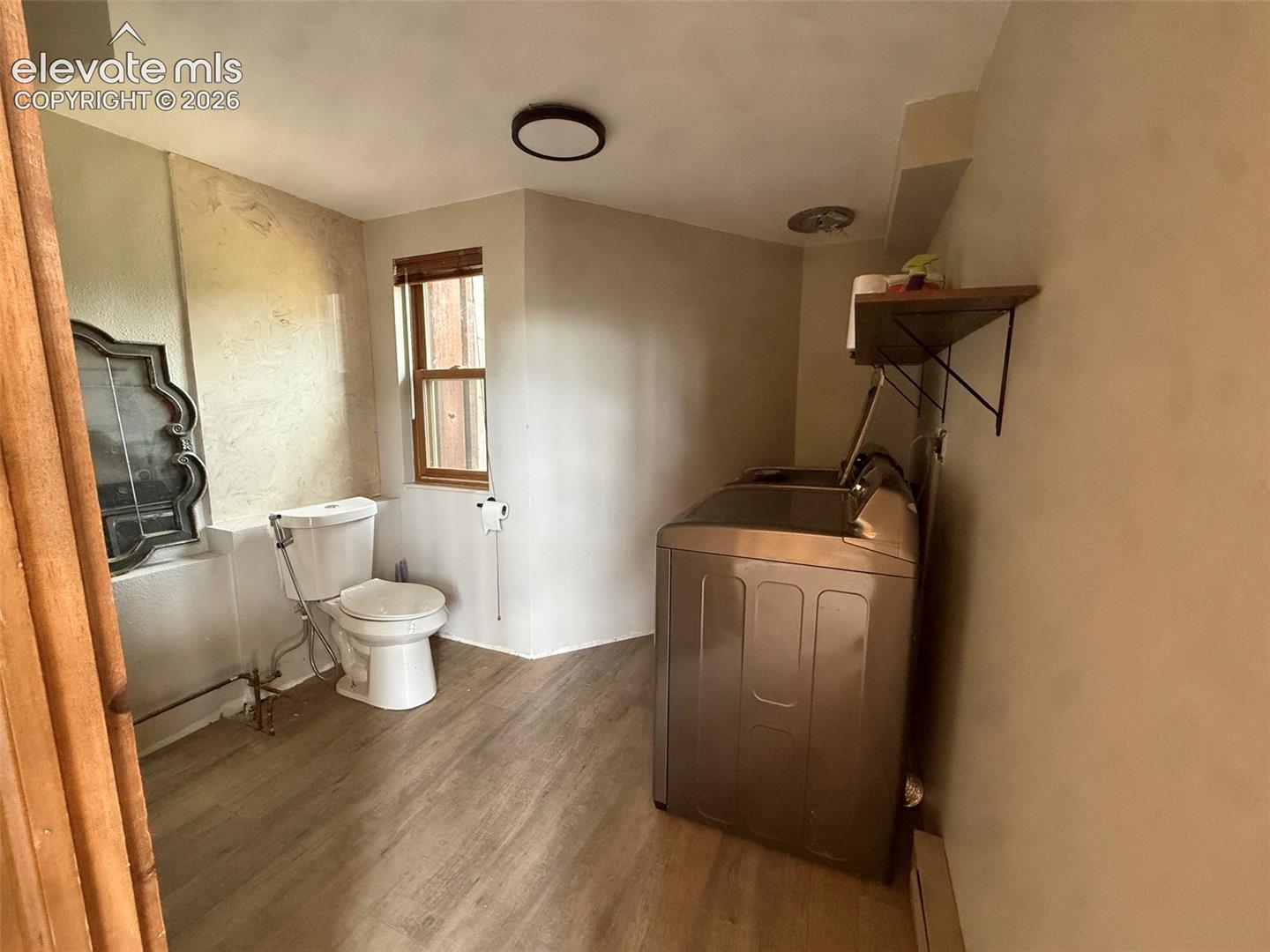 Guest bath and laundry off family room