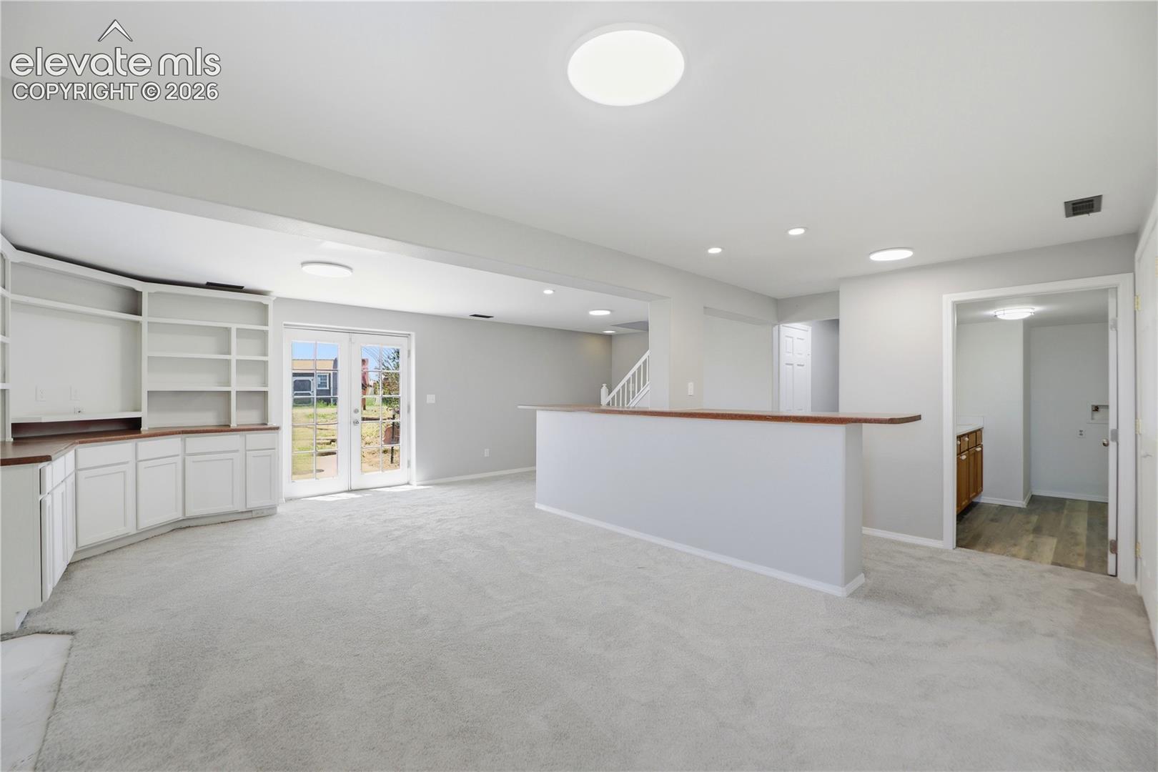 Carpet, Closets, Built Ins, Fireplace, Dry Bar