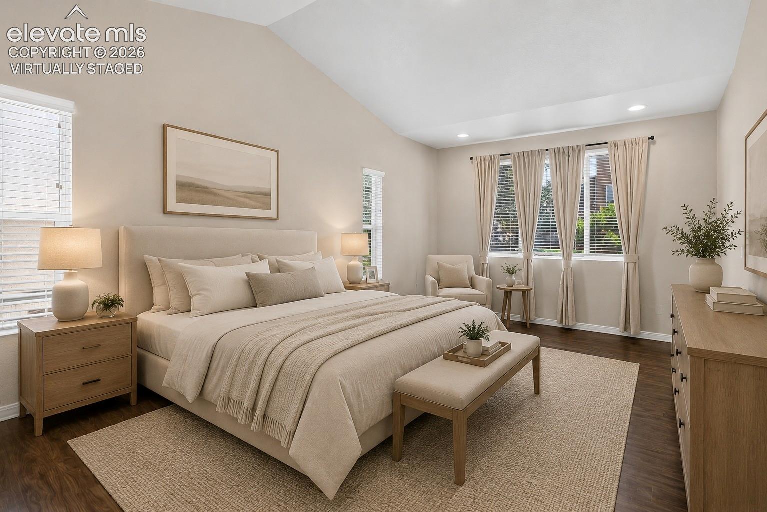 Virtually Staged - Vaulted ceiling, recessed lighting, dark wood-finish flooring, multiple windows, neutral wall tones