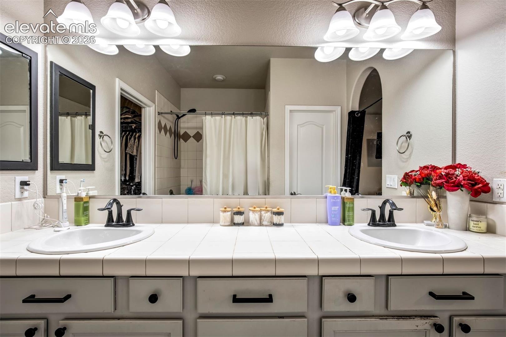 Primary bathroom has a large, soaking tub/shower