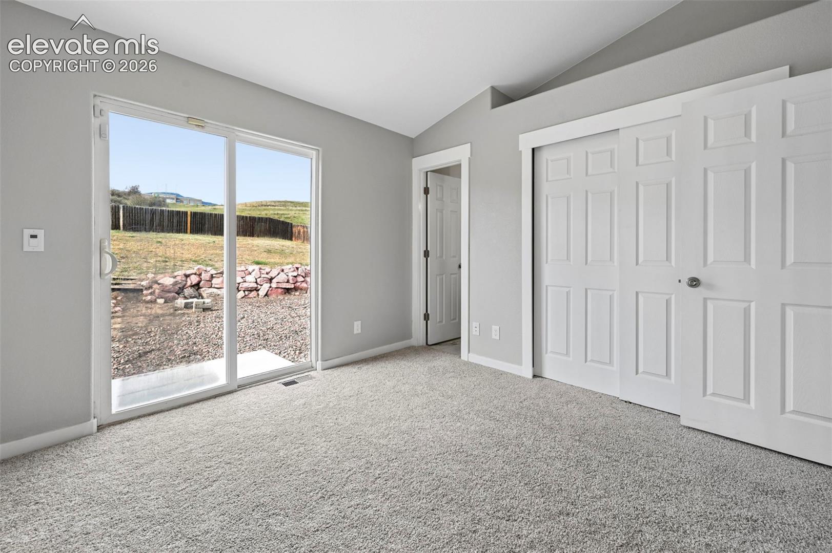 Vaulted ceilings, walk out and wall-to-wall carpeting