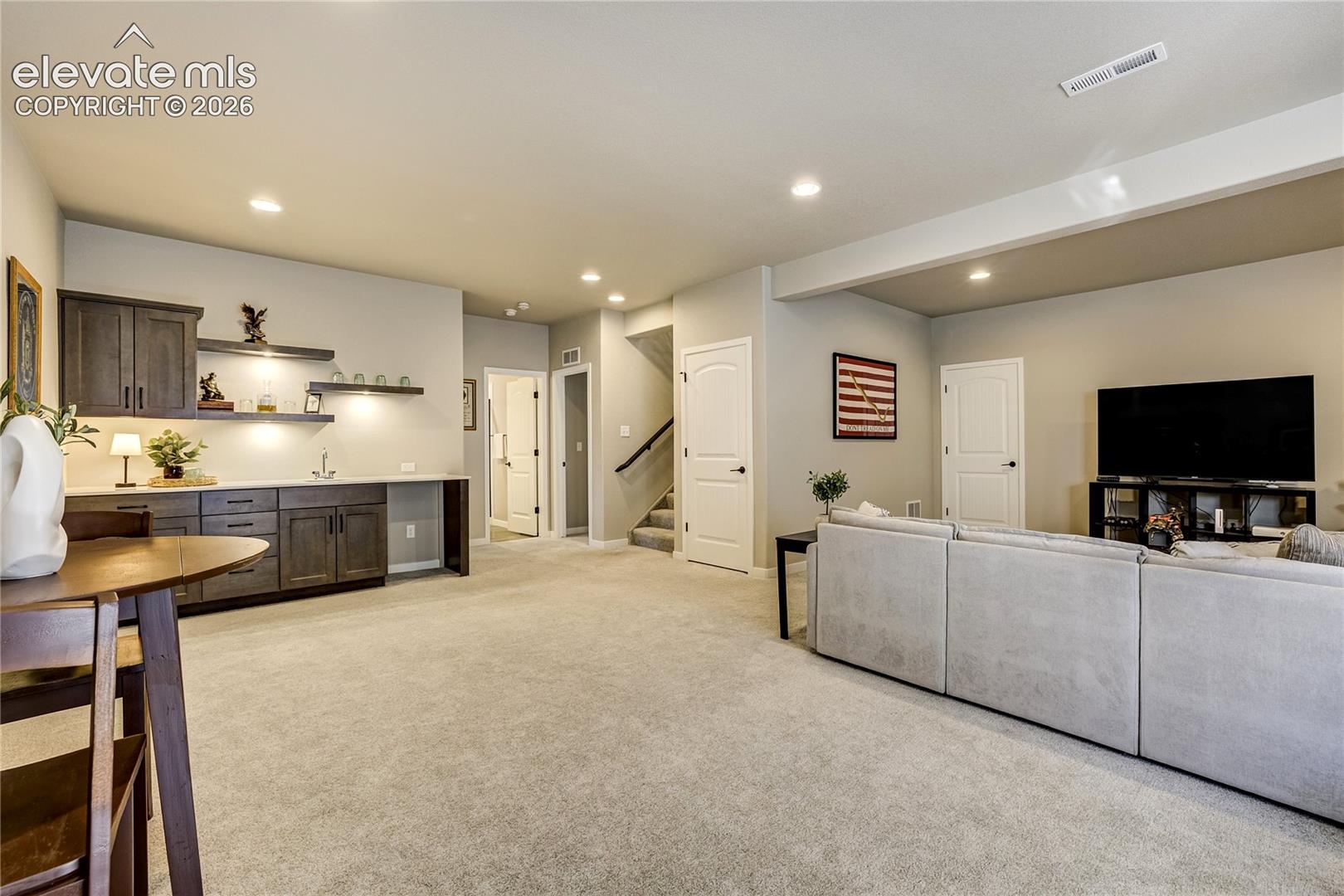 Ready to Entertain |
A stylish wet bar creates the perfect setting for hosting friends and family.