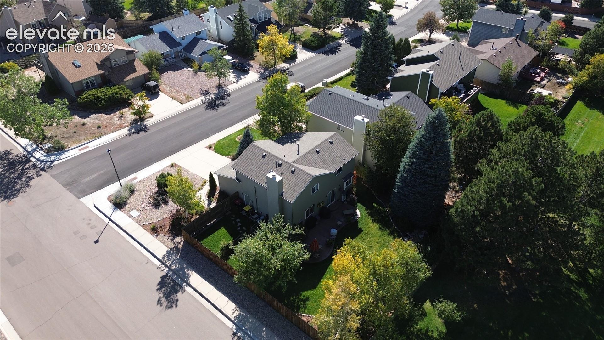 Aerial view of home and lot. Caddy corner to the spacious park.