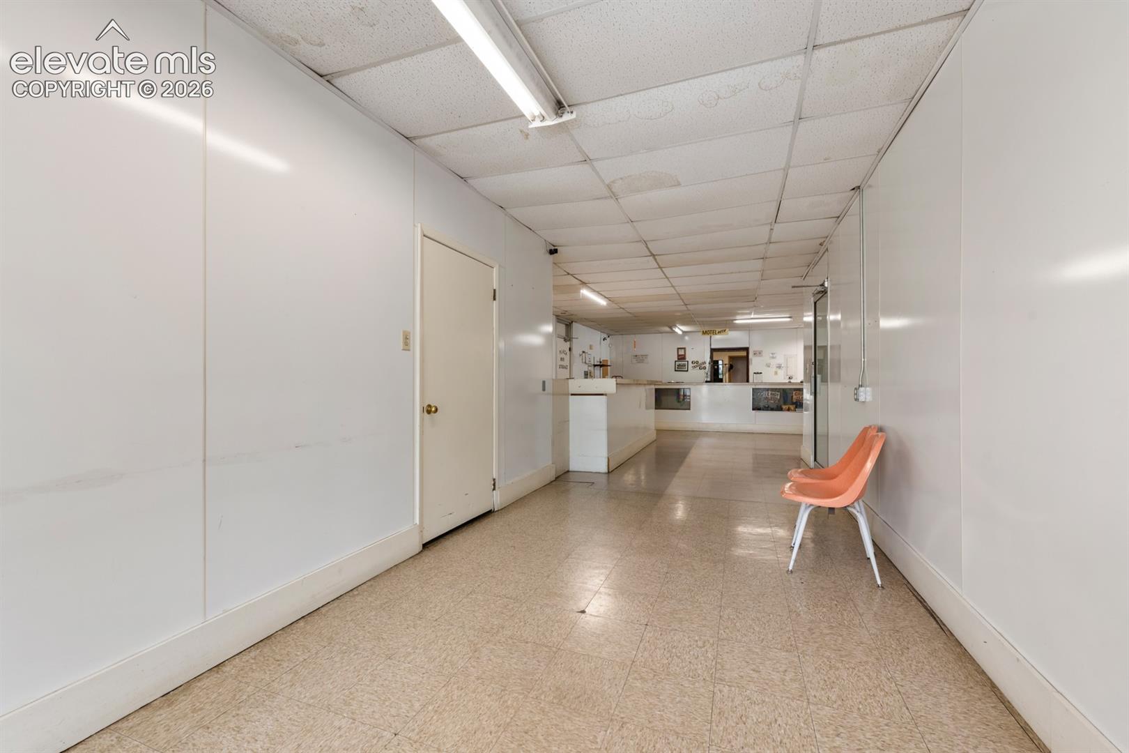 Hallway from the parking lot into laundromat or check in to motel room