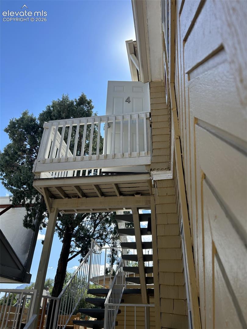 Exterior balcony with white railing