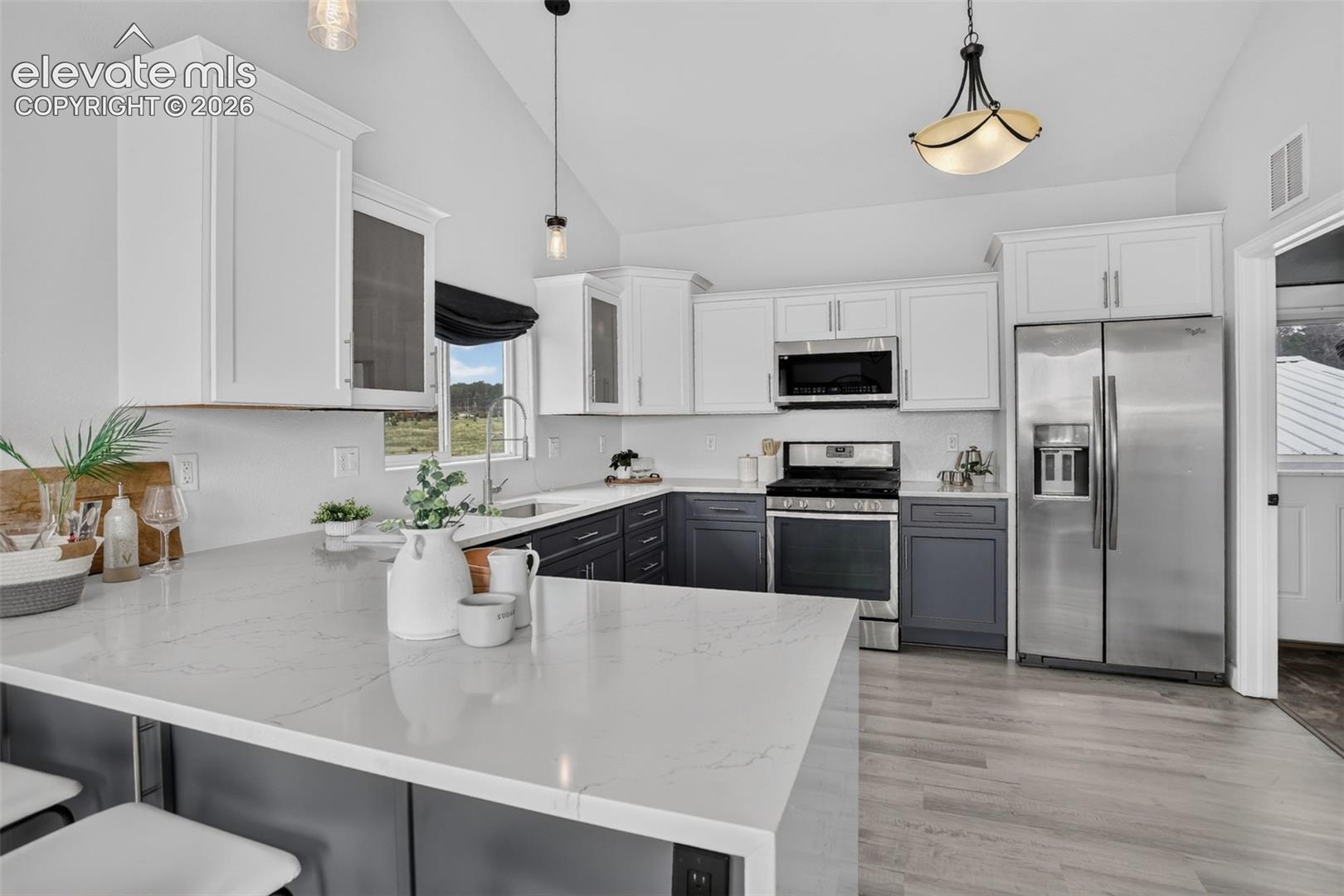 Beautiful waterfall Quartz counter tops.