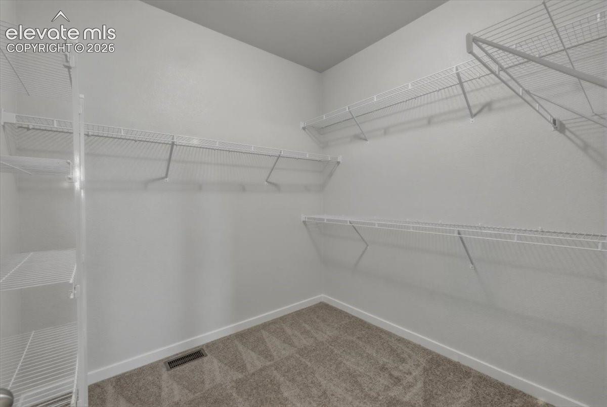 Primary walk in closet.