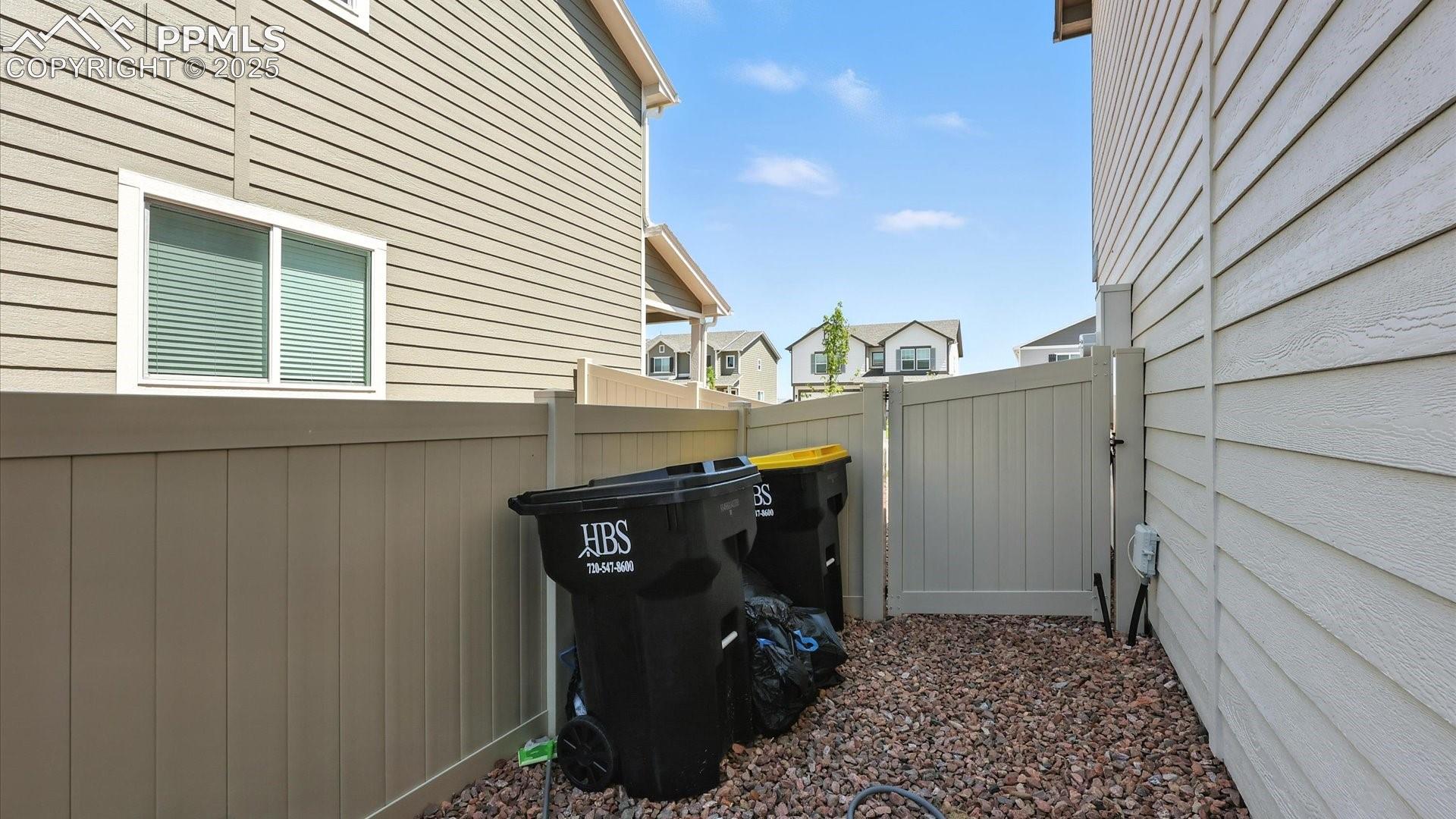 Side yard with gate to the front yard.