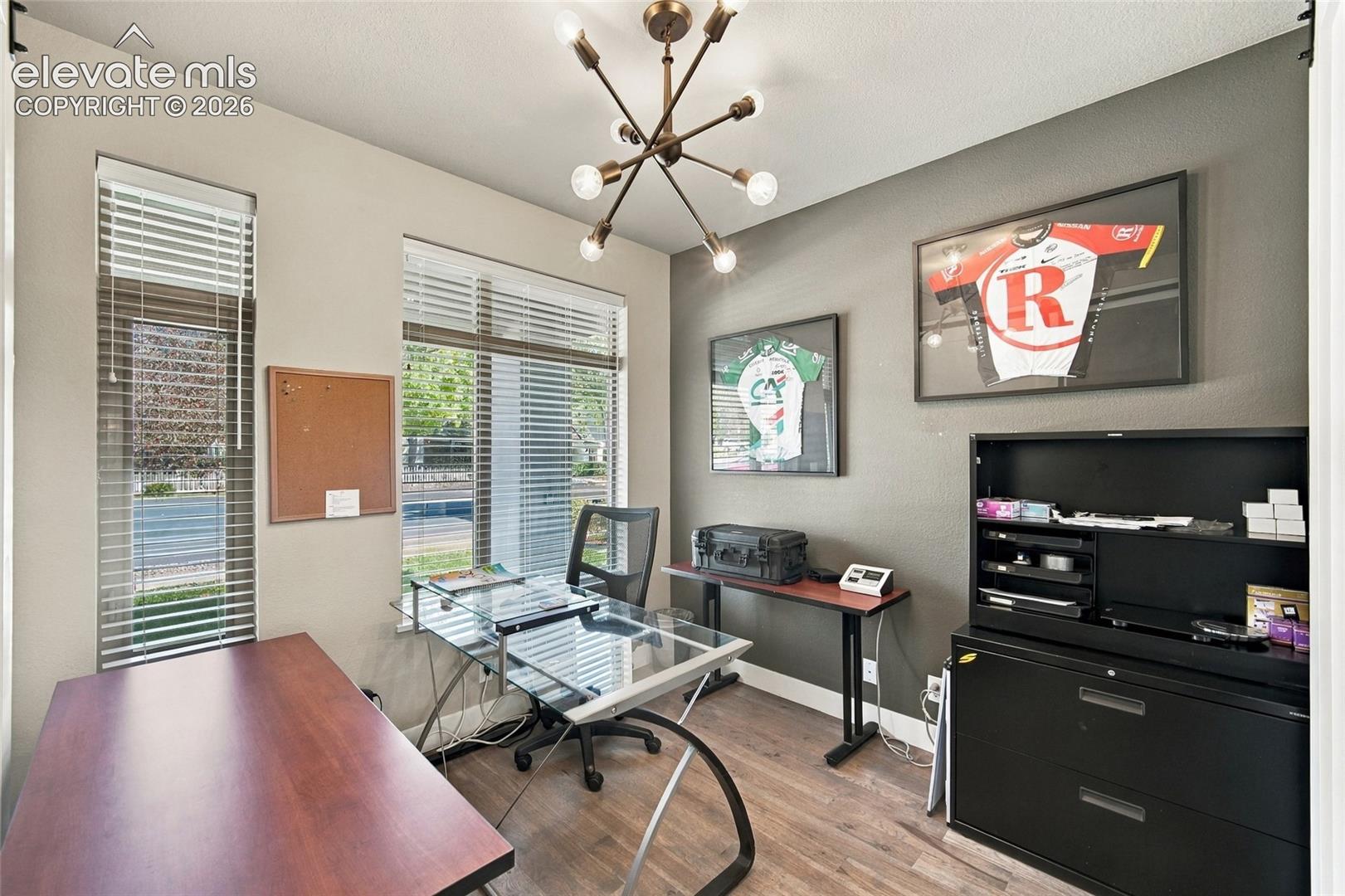 Main level off of entrance, dual sliding barn doors close off from living room