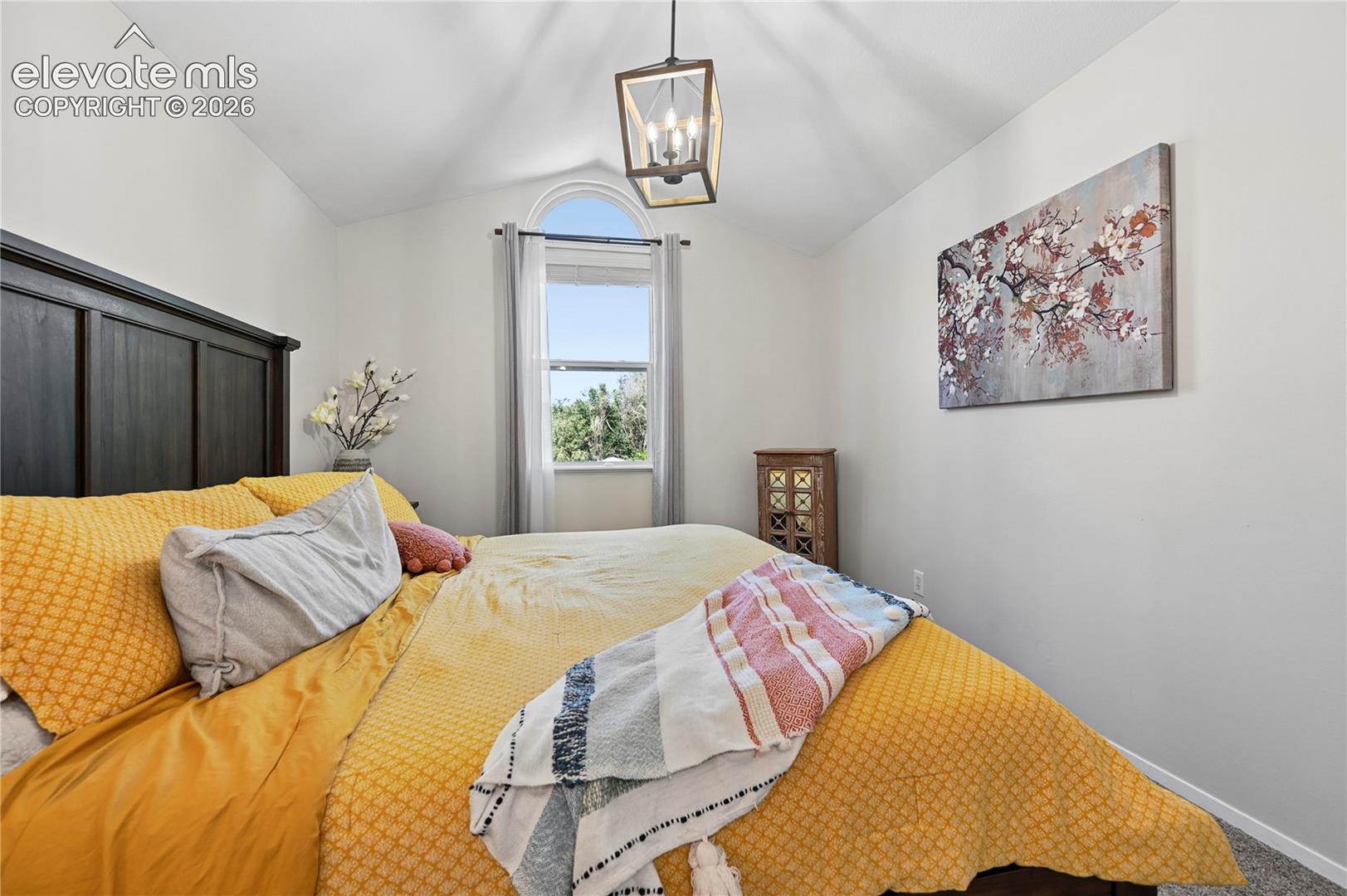 Primary Bedroom with Vaulted Ceiling