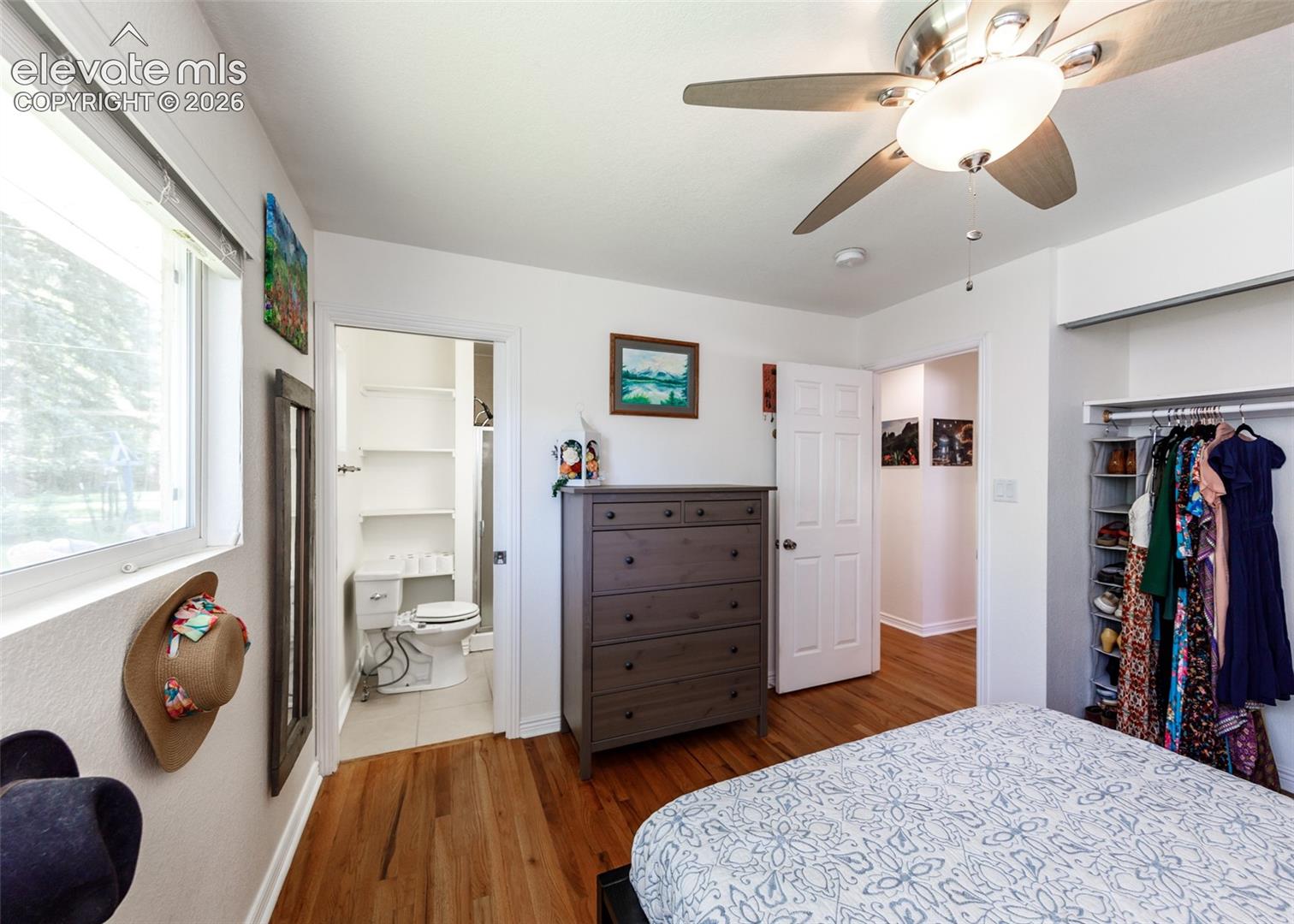 Hardwood flooring, recessed lighting, and a ceiling fan with integrated lighting