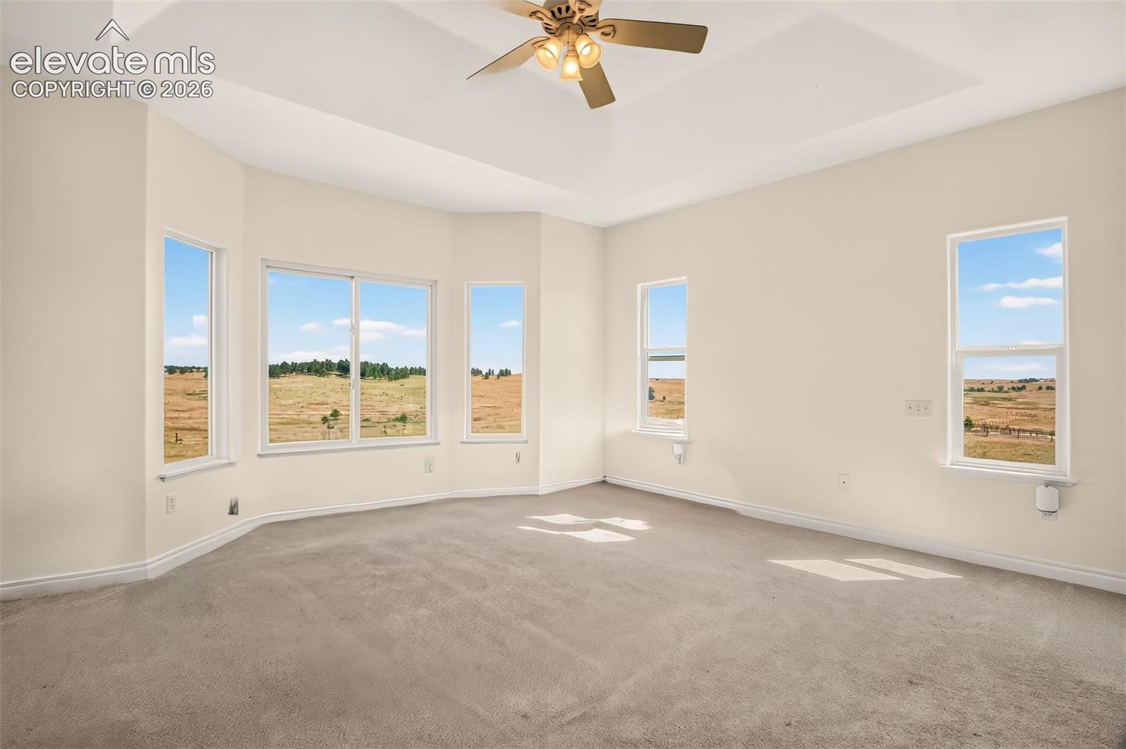Oversized Master With Tray Ceilings And Pasture Views
